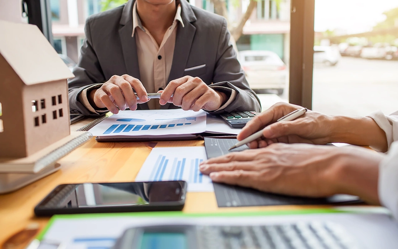 Homeowner reviewing financing options for impact windows